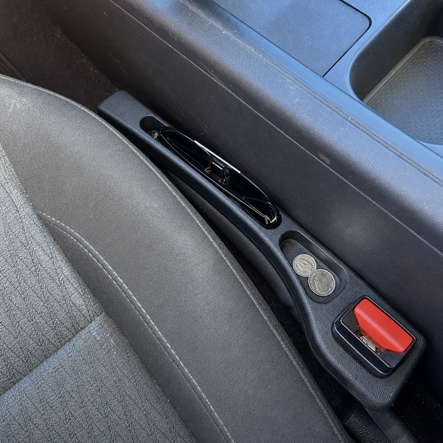 Customer-style view of Seat Seal installed beside a fabric car seat